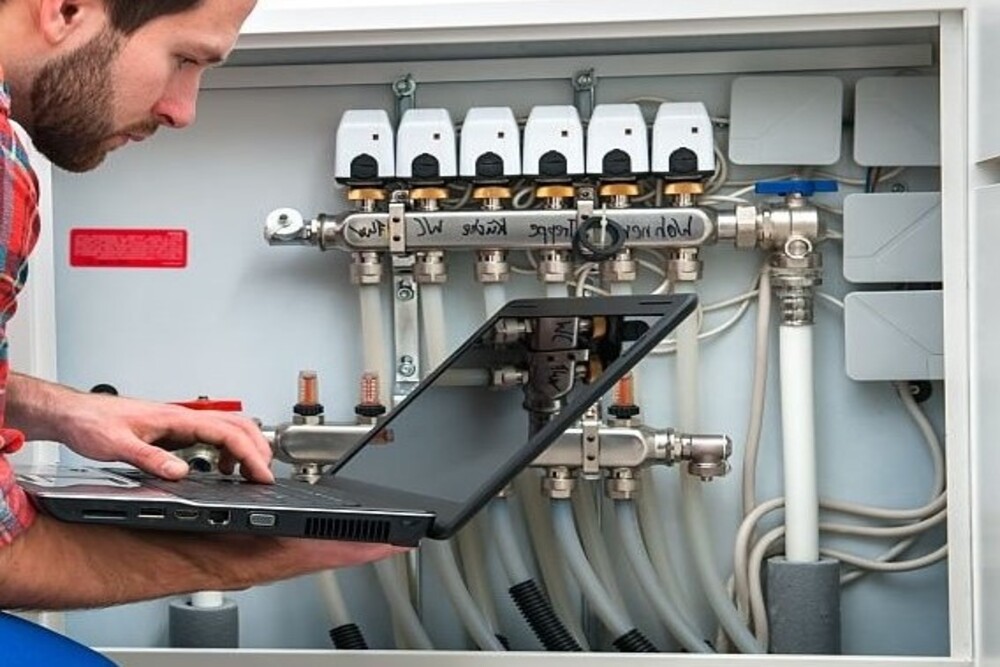 Technician servicing the underfloor heating